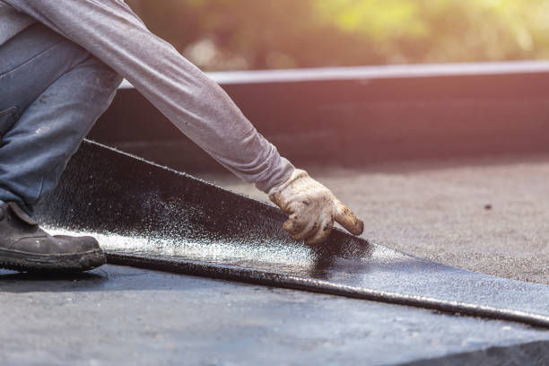 Professional Basement Waterproofing technician working in Wilmette, IL